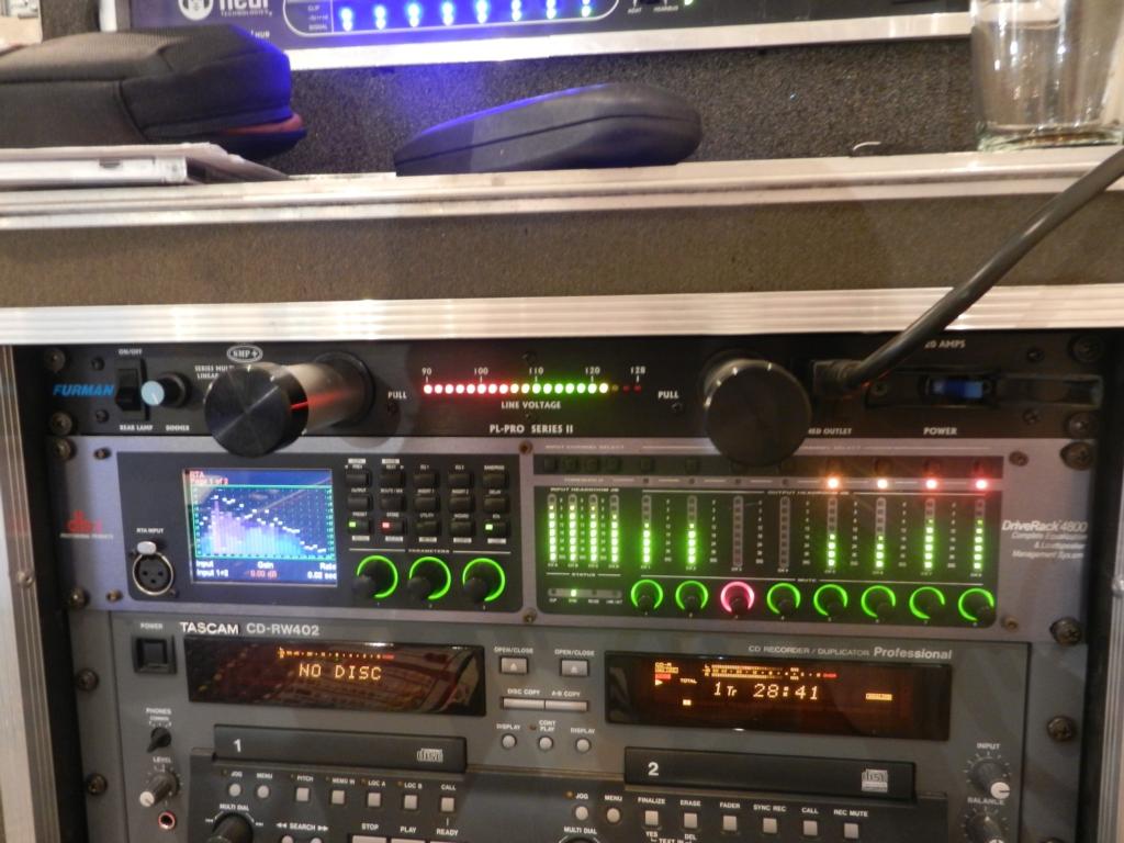 A loudspeaker management system in situ, mounted in the club's amp room, in a rack alongside the amplifiers.