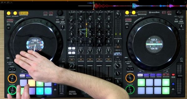 DJ performs techniques on a Pioneer DJ controller